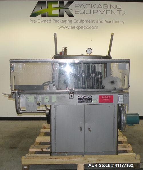 Used U.S. Bottlers Machinery Sanitair Bottle Air Cleaner, Model DS-12, Series #030156. Capable of speeds up to 275 bottles per minute. Has a bottle size range: (Diam) 1" to 4" (Height)up to 14". Last...