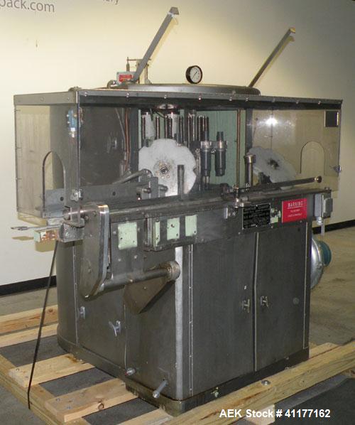 Used U.S. Bottlers Machinery Sanitair Bottle Air Cleaner, Model DS-12, Series #030156. Capable of speeds up to 275 bottles per minute. Has a bottle size range: (Diam) 1" to 4" (Height)up to 14". Last...