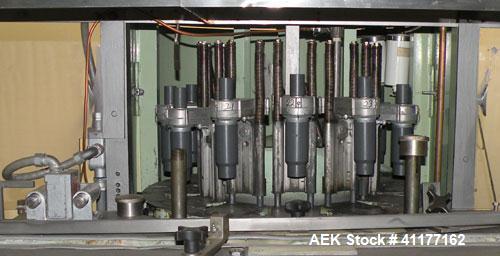 Used U.S. Bottlers Machinery Sanitair Bottle Air Cleaner, Model DS-12, Series #030156. Capable of speeds up to 275 bottles per minute. Has a bottle size range: (Diam) 1" to 4" (Height)up to 14". Last...