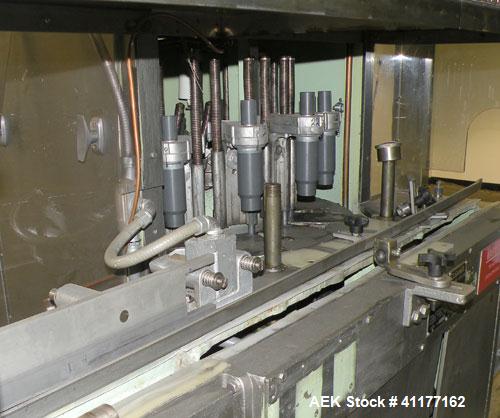 Used U.S. Bottlers Machinery Sanitair Bottle Air Cleaner, Model DS-12, Series #030156. Capable of speeds up to 275 bottles per minute. Has a bottle size range: (Diam) 1" to 4" (Height)up to 14". Last...