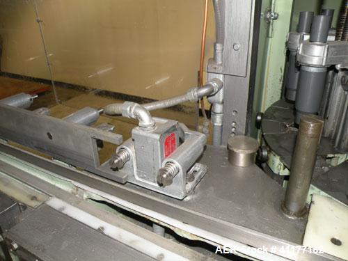 Used U.S. Bottlers Machinery Sanitair Bottle Air Cleaner, Model DS-12, Series #030156. Capable of speeds up to 275 bottles per minute. Has a bottle size range: (Diam) 1" to 4" (Height)up to 14". Last...