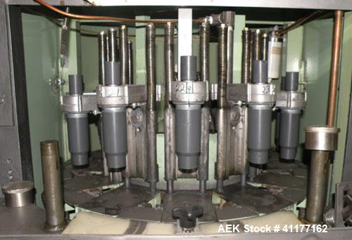 Used U.S. Bottlers Machinery Sanitair Bottle Air Cleaner, Model DS-12, Series #030156. Capable of speeds up to 275 bottles per minute. Has a bottle size range: (Diam) 1" to 4" (Height)up to 14". Last...