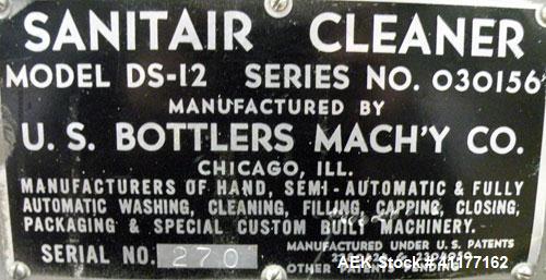 Used U.S. Bottlers Machinery Sanitair Bottle Air Cleaner, Model DS-12, Series #030156. Capable of speeds up to 275 bottles per minute. Has a bottle size range: (Diam) 1" to 4" (Height)up to 14". Last...