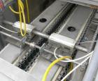 Used Bevco Low Level Bottle Gripper Air Rinser/ Inverter, Model 600, 304 stainless steel. Approximately 400 bottles per minute. Unit is on 12' centers from centerline of wheel to centerline, maximum ...