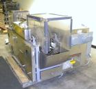 Used Standard Bottle Inverter Air Cleaner, Model JI-600-HV. Includes control box and emergency shut-off switches, speed controls, (1) section of right angle stationary bottle conveyor, approximately ...