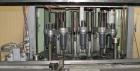 Used U.S. Bottlers Machinery Sanitair Bottle Air Cleaner, Model DS-12, Series #030156. Capable of speeds up to 275 bottles per minute. Has a bottle size range: (Diam) 1
