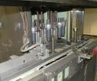 Used U.S. Bottlers Machinery Sanitair Bottle Air Cleaner, Model DS-12, Series #030156. Capable of speeds up to 275 bottles per minute. Has a bottle size range: (Diam) 1