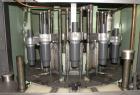 Used U.S. Bottlers Machinery Sanitair Bottle Air Cleaner, Model DS-12, Series #030156. Capable of speeds up to 275 bottles per minute. Has a bottle size range: (Diam) 1