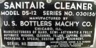 Used U.S. Bottlers Machinery Sanitair Bottle Air Cleaner, Model DS-12, Series #030156. Capable of speeds up to 275 bottles per minute. Has a bottle size range: (Diam) 1