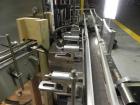 Used U.S. Bottlers Machinery Model Sanitair Cleaner DS-8 Rotary Air Bottle Cleaner capable of speeds up to 150 containers per minute. Uses a dual-stage cleaning process. Has duplex cleaning station c...