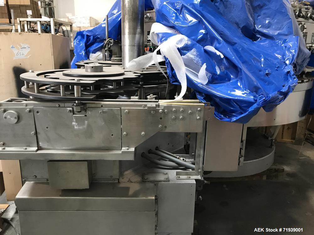 Used Bevcorp Crown Uni-Blend 45-12 Valve Bottle Filler. Speed 12 oz up to 400 bpm. 460 V, 60 Hz, 3 Phase. Glass explosion shields included. Reported to be reconditioned. Mfg. 2007