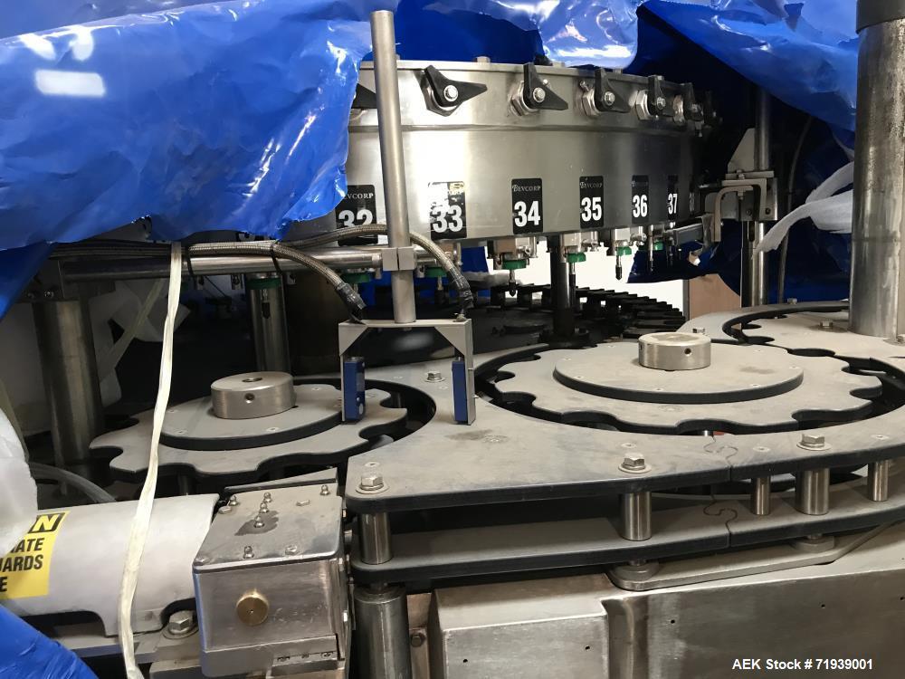 Used Bevcorp Crown Uni-Blend 45-12 Valve Bottle Filler. Speed 12 oz up to 400 bpm. 460 V, 60 Hz, 3 Phase. Glass explosion shields included. Reported to be reconditioned. Mfg. 2007