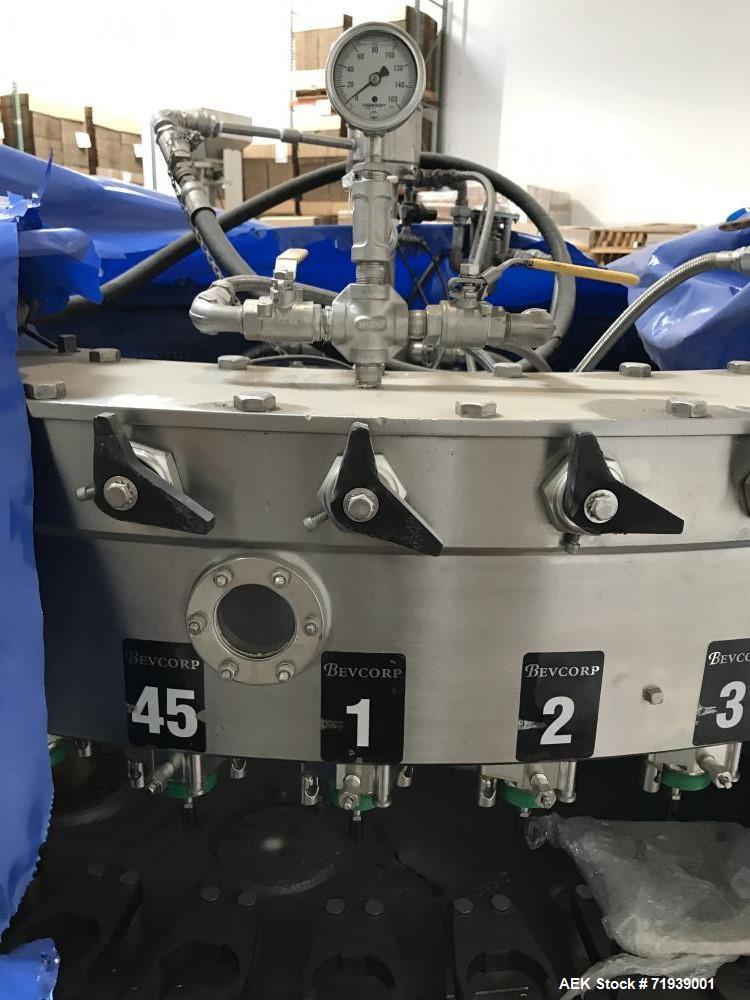 Used Bevcorp Crown Uni-Blend 45-12 Valve Bottle Filler. Speed 12 oz up to 400 bpm. 460 V, 60 Hz, 3 Phase. Glass explosion shields included. Reported to be reconditioned. Mfg. 2007