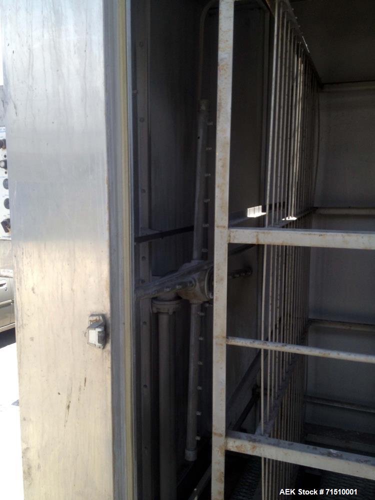 Used Alvey Tray Washer, Model KS-70. (2) Tray racks/carts, each cart holds 45 trays. Maximum tray dimensions 21"x 26 1/2". (3) levels of 15 trays on the cart. 3 phase/ 60 cycles / 208 Volts. 72" wide...