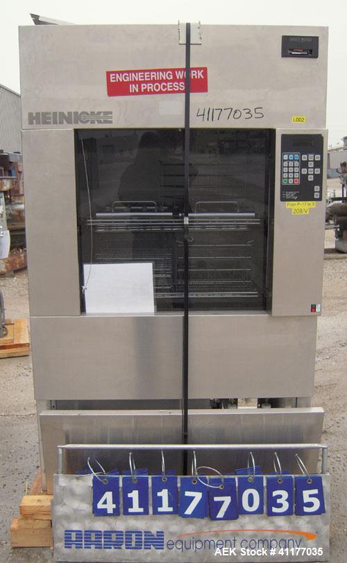 Used Heinicke/Hotpack Floor Glassware Washer, Model H-4100E. 316L stainless steel chamber, 29" wide x 27" deep x 26" high. Power vertical tempered glass door, 8 basket design, 304 stainless steel ext...