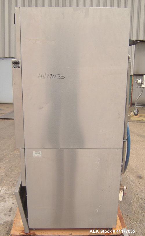 Used Heinicke/Hotpack Floor Glassware Washer, Model H-4100E. 316L stainless steel chamber, 29" wide x 27" deep x 26" high. Power vertical tempered glass door, 8 basket design, 304 stainless steel ext...