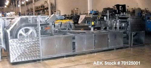 Used Bevco High Speed Bottle Washer, all stainless steel. Approximately 24' long, adjustable, with motor drives and electronics, approximately 5 hp, 230 volt. Serial #J1969. Machine footprint 276" lo...