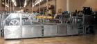 Used Bevco High Speed Bottle Washer, all stainless steel. Approximately 24' long, adjustable, with motor drives and electronics, approximately 5 hp, 230 volt. Serial #J1969. Machine footprint 276
