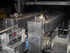 Used Bevco High Speed Bottle Washer, all stainless steel. Approximately 24' long, adjustable, with motor drives and electronics, approximately 5 hp, 230 volt. Serial #J1969. Machine footprint 276