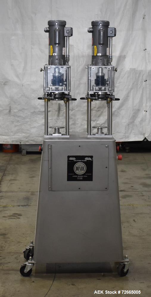 Used Dixie Twin Double Can Seamer, Model 25D-TWIN-AL. Capable of up to 30 cans per minute. Adaptable for closing containers from 2" to 4-1/4" diameter and up to 7" tall. Semi-automatic can seamer wit...