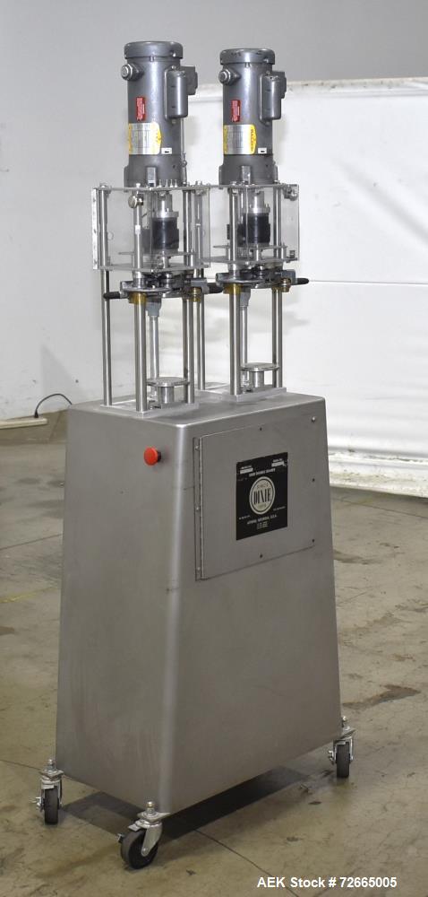 Used Dixie Twin Double Can Seamer, Model 25D-TWIN-AL. Capable of up to 30 cans per minute. Adaptable for closing containers from 2" to 4-1/4" diameter and up to 7" tall. Semi-automatic can seamer wit...