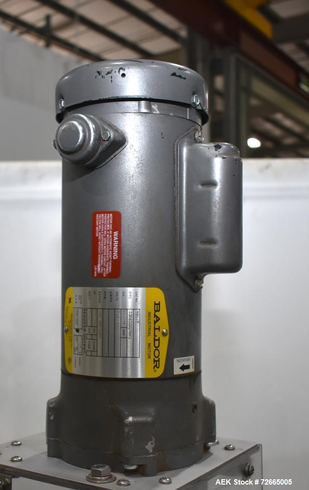Used Dixie Twin Double Can Seamer, Model 25D-TWIN-AL. Capable of up to 30 cans per minute. Adaptable for closing containers from 2" to 4-1/4" diameter and up to 7" tall. Semi-automatic can seamer wit...