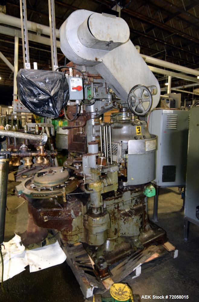 Used American Can (4) Head Can Closing Machine, Model 458-4DS. Set up for 300x407 cans, disc infeed with spring loaded topper, turret & outer rail steam flow, 211-307 seaming heads, disc discharge.