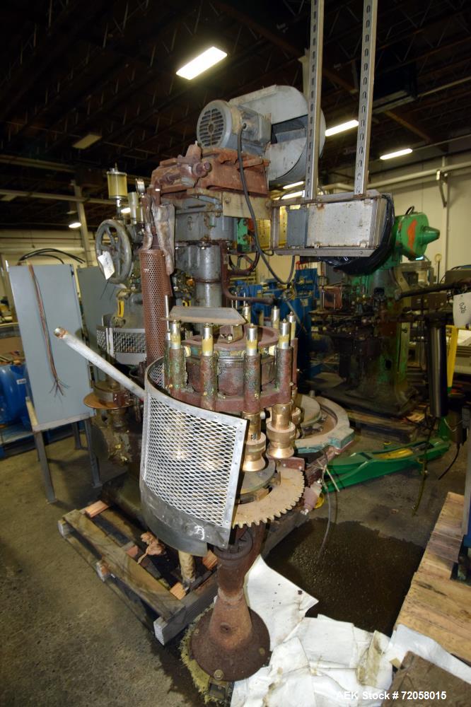Used American Can (4) Head Can Closing Machine, Model 458-4DS. Set up for 300x407 cans, disc infeed with spring loaded topper, turret & outer rail steam flow, 211-307 seaming heads, disc discharge.