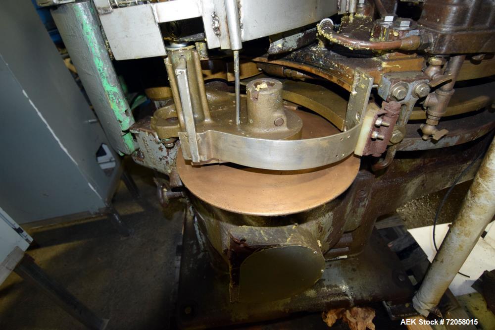 Used American Can (4) Head Can Closing Machine, Model 458-4DS. Set up for 300x407 cans, disc infeed with spring loaded topper, turret & outer rail steam flow, 211-307 seaming heads, disc discharge.