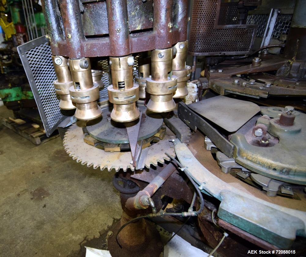 Used American Can (4) Head Can Closing Machine, Model 458-4DS. Set up for 300x407 cans, disc infeed with spring loaded topper, turret & outer rail steam flow, 211-307 seaming heads, disc discharge.