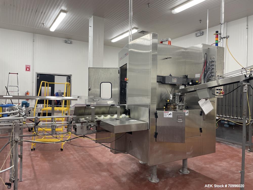 Used Pneumatic Scale Can Seamer, Model 2004RCM-1 set up on 302/301 diameter cans. Has Fleetwood extended magazine feed. Worm screw to star container handling. Can size range: 202 - 408 (diameter) x 1...