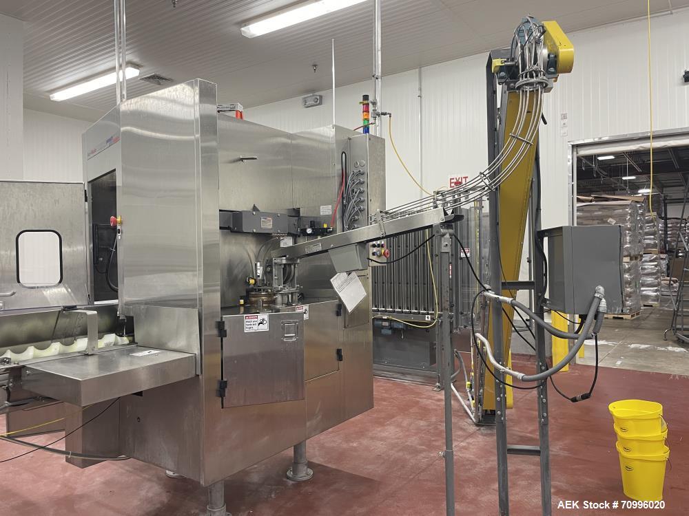 Used Pneumatic Scale Can Seamer, Model 2004RCM-1 set up on 302/301 diameter cans. Has Fleetwood extended magazine feed. Worm screw to star container handling. Can size range: 202 - 408 (diameter) x 1...