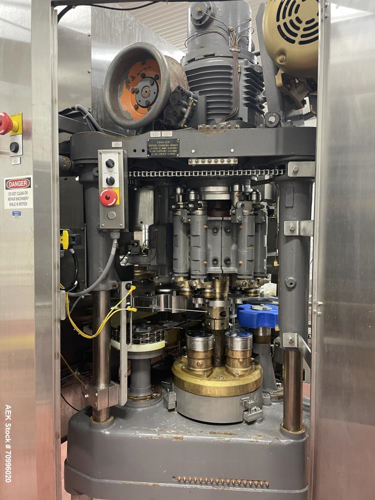 Used Pneumatic Scale Can Seamer, Model 2004RCM-1 set up on 302/301 diameter cans. Has Fleetwood extended magazine feed. Worm screw to star container handling. Can size range: 202 - 408 (diameter) x 1...