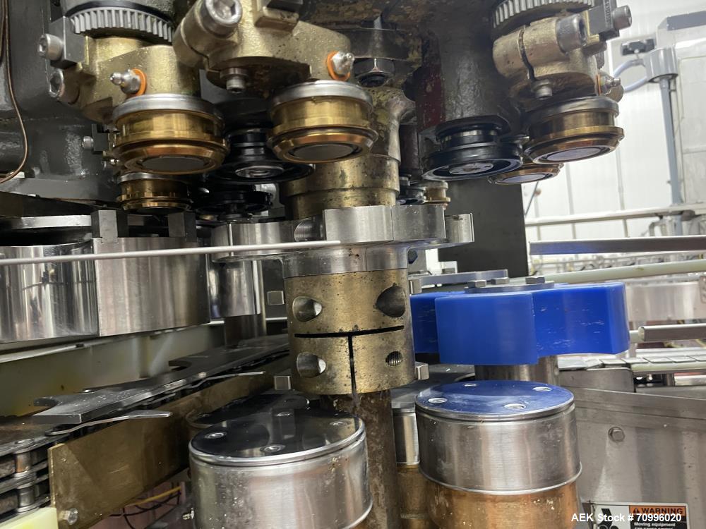 Used Pneumatic Scale Can Seamer, Model 2004RCM-1 set up on 302/301 diameter cans. Has Fleetwood extended magazine feed. Worm screw to star container handling. Can size range: 202 - 408 (diameter) x 1...