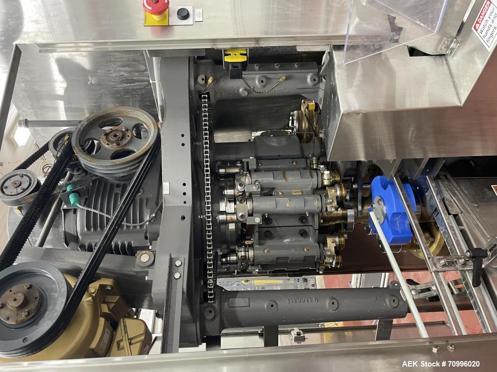 Used Pneumatic Scale Can Seamer, Model 2004RCM-1 set up on 302/301 diameter cans. Has Fleetwood extended magazine feed. Worm screw to star container handling. Can size range: 202 - 408 (diameter) x 1...