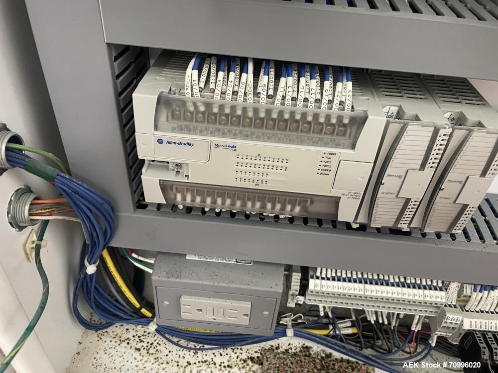 Used Pneumatic Scale Can Seamer, Model 2004RCM-1 set up on 302/301 diameter cans. Has Fleetwood extended magazine feed. Worm screw to star container handling. Can size range: 202 - 408 (diameter) x 1...