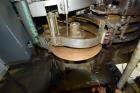 Used American Can (4) Head Can Closing Machine, Model 458-4DS. Set up for 300x407 cans, disc infeed with spring loaded topper, turret & outer rail steam flow, 211-307 seaming heads, disc discharge.