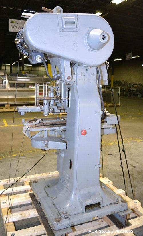 Used Canco Model 06 Automatic Can Seamer. Machine is capable of speeds up to 50 cans per minute. Can size range: (Diameter) 200 to 404, (Height) 2-1/2" to 5-1/4". Currently set up on 401 diameter can...