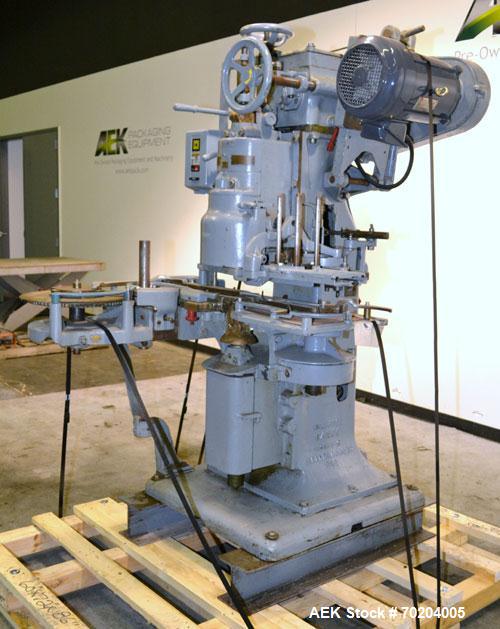 Used Canco Model 06 Automatic Can Seamer. Machine is capable of speeds up to 50 cans per minute. Can size range: (Diameter) 200 to 404, (Height) 2-1/2" to 5-1/4". Currently set up on 401 diameter can...