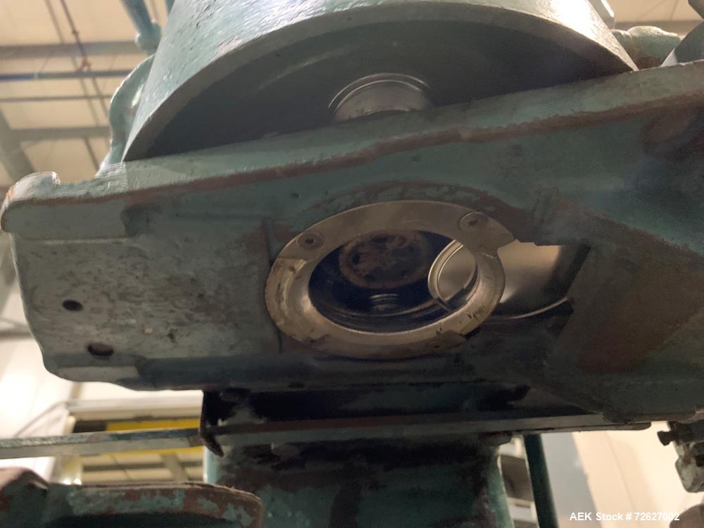 Used Canco (American Can) Model 06 Atmospheric Can Seamer. Capable of speeds up to 90 cans per minute. Currently set on 307 diameter cans. Has a can size range: diameter 202 - 404; height 213-604. Ha...