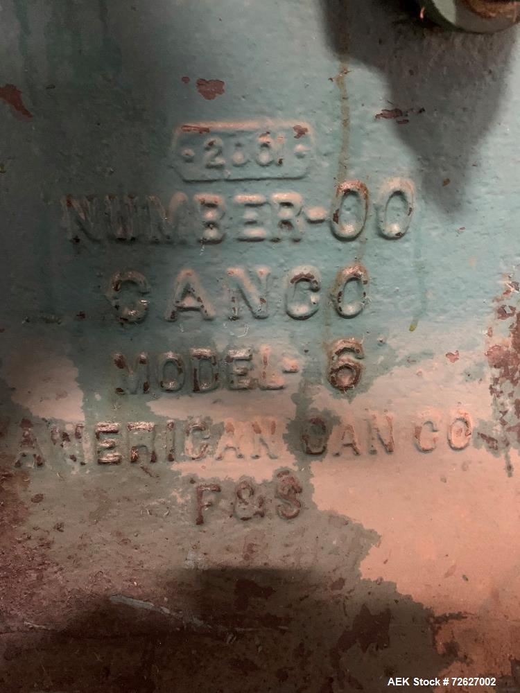 Used Canco (American Can) Model 06 Atmospheric Can Seamer. Capable of speeds up to 90 cans per minute. Currently set on 307 diameter cans. Has a can size range: diameter 202 - 404; height 213-604. Ha...