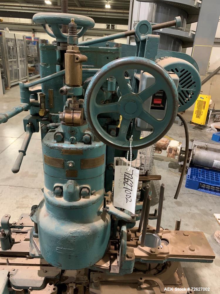 Used Canco (American Can) Model 06 Atmospheric Can Seamer. Capable of speeds up to 90 cans per minute. Currently set on 307 diameter cans. Has a can size range: diameter 202 - 404; height 213-604. Ha...