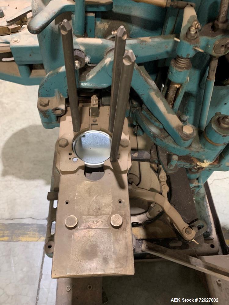 Used Canco (American Can) Model 06 Atmospheric Can Seamer. Capable of speeds up to 90 cans per minute. Currently set on 307 diameter cans. Has a can size range: diameter 202 - 404; height 213-604. Ha...