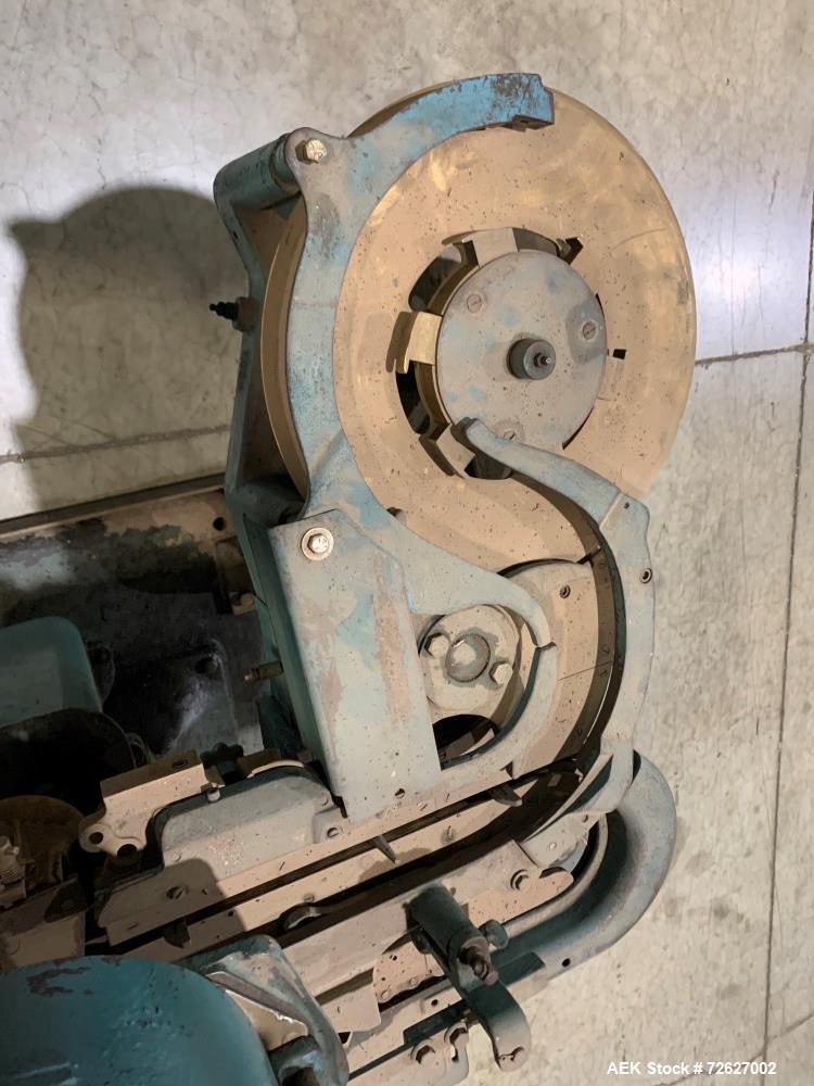 Used Canco (American Can) Model 06 Atmospheric Can Seamer. Capable of speeds up to 90 cans per minute. Currently set on 307 diameter cans. Has a can size range: diameter 202 - 404; height 213-604. Ha...