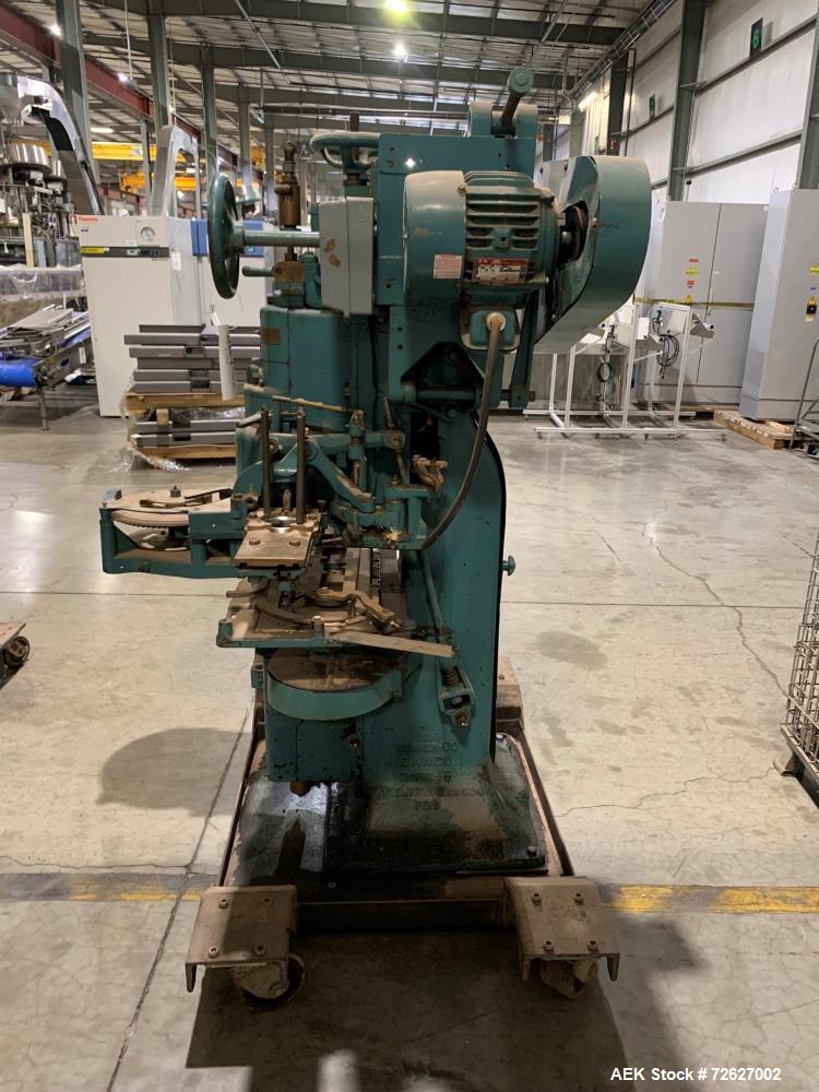 Used Canco (American Can) Model 06 Atmospheric Can Seamer. Capable of speeds up to 90 cans per minute. Currently set on 307 diameter cans. Has a can size range: diameter 202 - 404; height 213-604. Ha...
