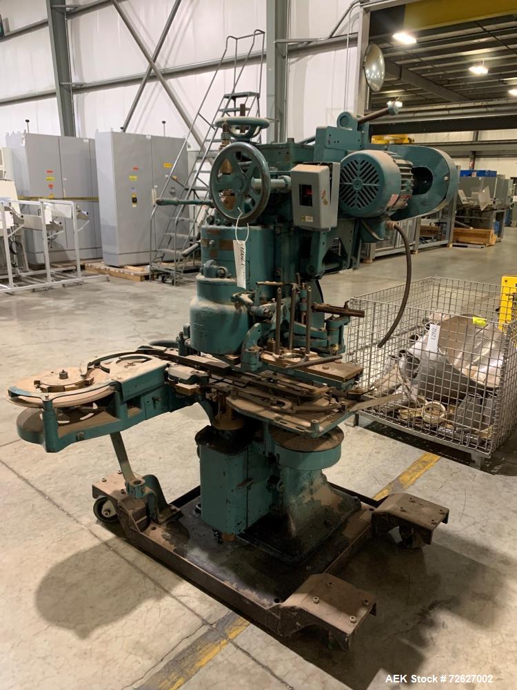 Used Canco (American Can) Model 06 Atmospheric Can Seamer. Capable of speeds up to 90 cans per minute. Currently set on 307 diameter cans. Has a can size range: diameter 202 - 404; height 213-604. Ha...