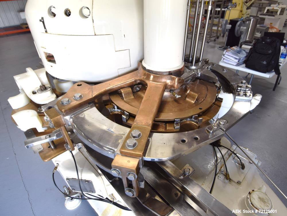 Used-Sutthiphong Engineering Can Seamer, Model C400. (4) Seaming heads, lid magazine, infeed conveyor. Serial# STP298, rebui...