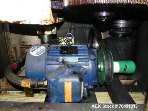 Used Nalbach Model 8 H.V.C. 8-Head Rotary Cap Crimper. Machine is capable of speeds up to 240 caps per minute. Is an 8-head crimper currently set on 25mm caps. Has worm screw to star wheel infeed. Ro...