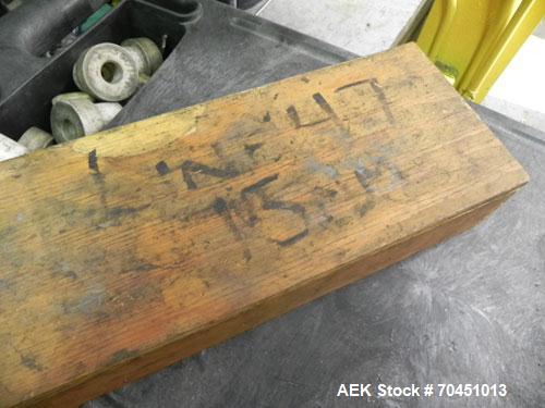 Used Nalbach Model 8 H.V.C. 8-Head Rotary Cap Crimper. Machine is capable of speeds up to 240 caps per minute. Is an 8-head crimper currently set on 25mm caps. Has worm screw to star wheel infeed. Ro...