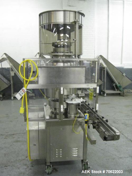 Used Genesis (West Packaging) Model RW-600LH Crimp Capper. Machine is capable of speeds up to 600 vials per minute. GMP design, gravity feed cap hopper. Vial size range: diameter 0.5-2.25", height 1....